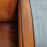Sheepskin Art Deco design armchair with wood and beautiful cognac-colored leather