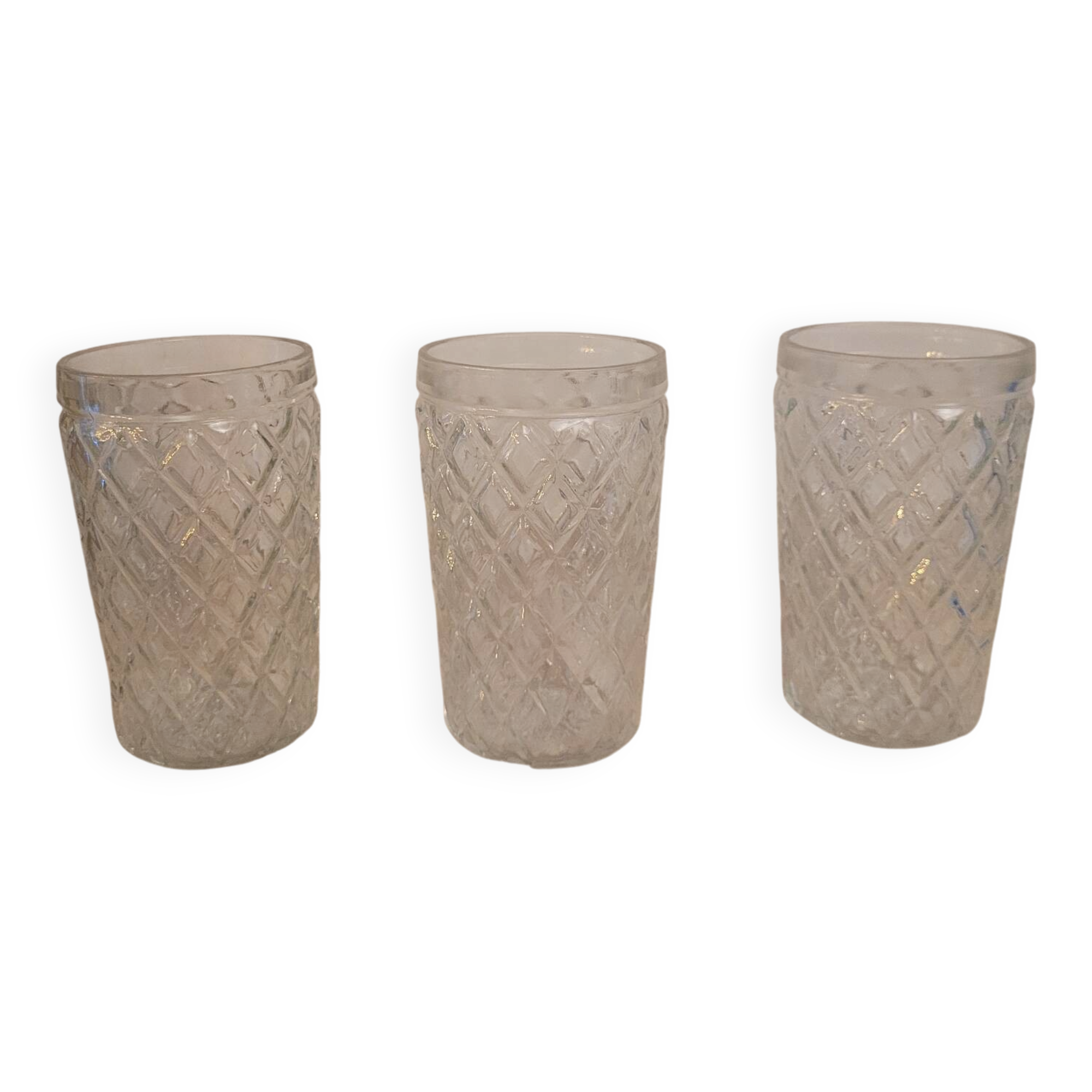 Set of three long drink glasses in pressed glass with a diamond pattern, 1960.