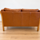Vintage Danish 2 person sofa in cognac leather with oak frame