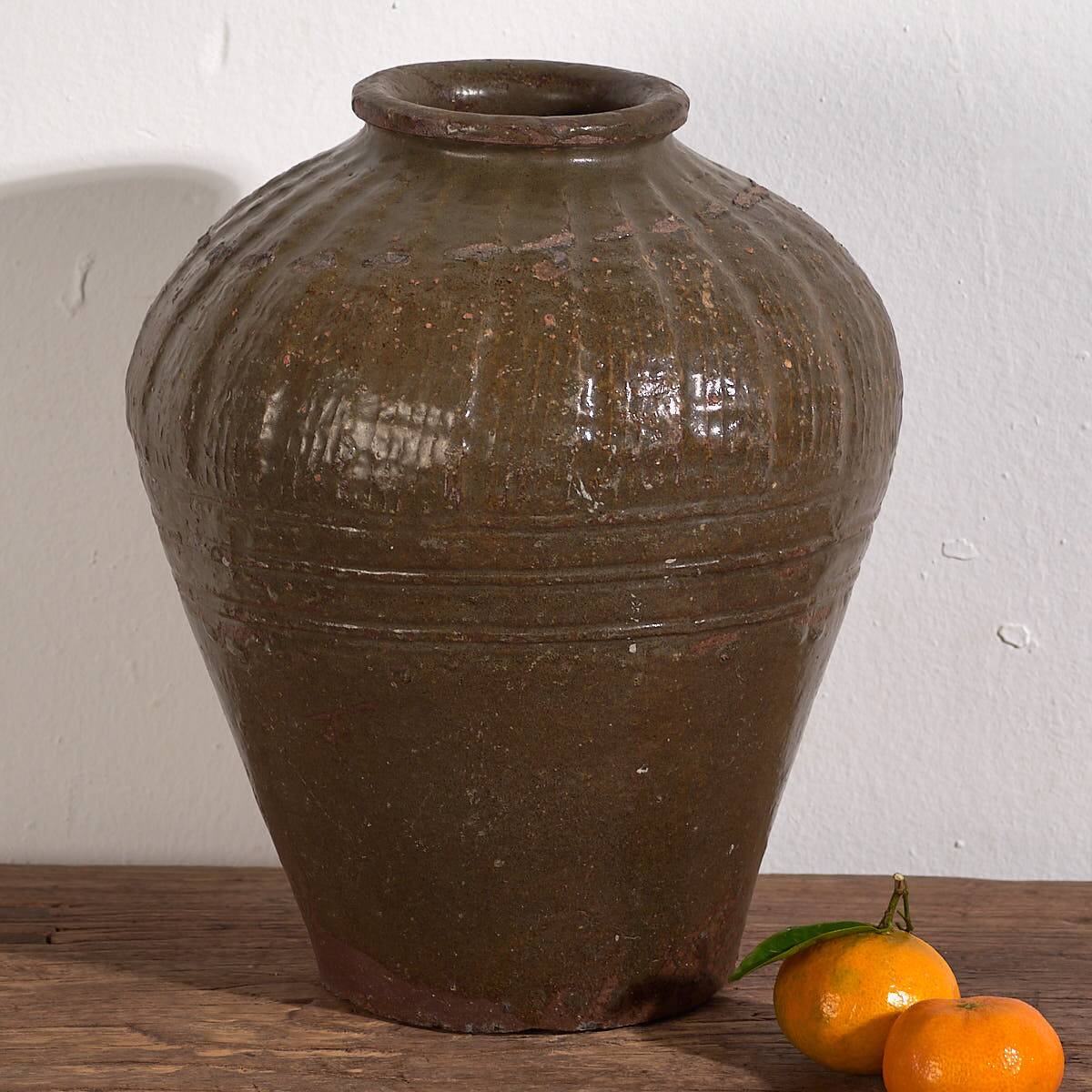 Small antique olive green vase (c.1900)