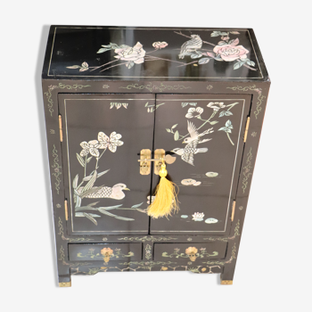 Small storage or bedside table lacquered black, incised and painted