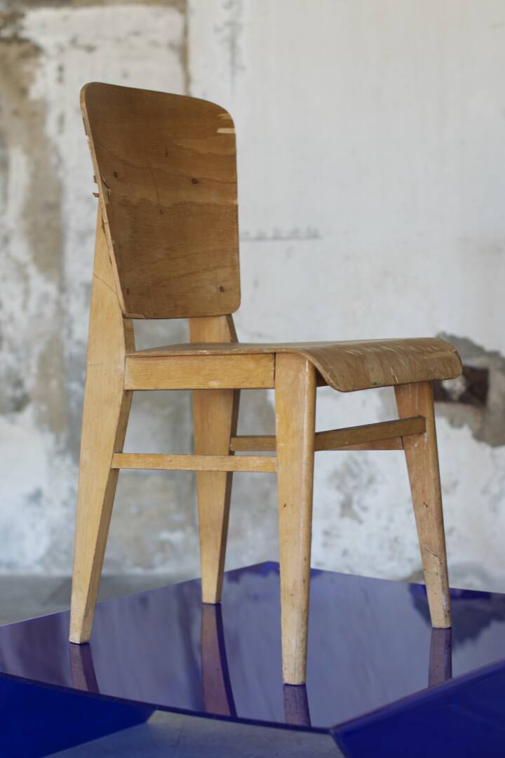 two  style wooden chairs