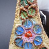 Flower-decorated sandstone mirror, circa 1970