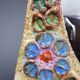Flower-decorated sandstone mirror, circa 1970