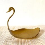 Empty brass swan pocket