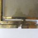 Double-sided carousel photo frame in gold metal