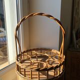 Vintage basket bottle holder in rattan wicker