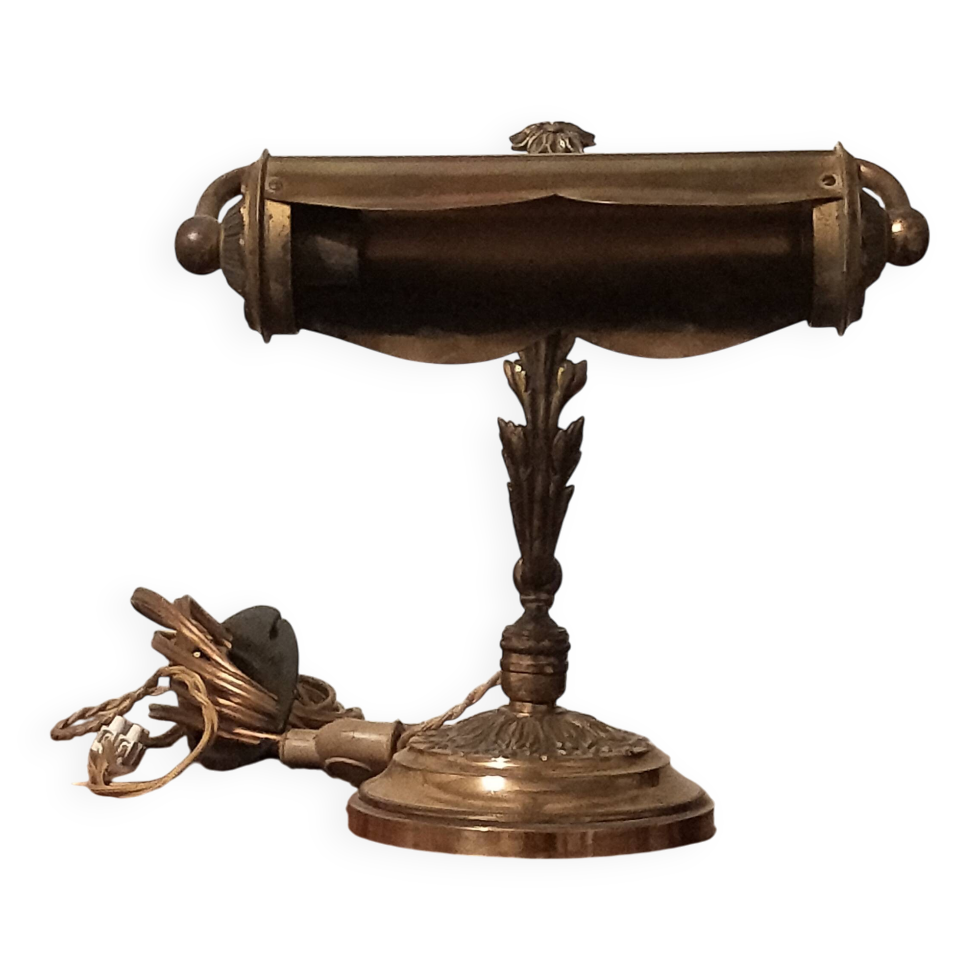 Antique desk piano lamp in chiselled brass.