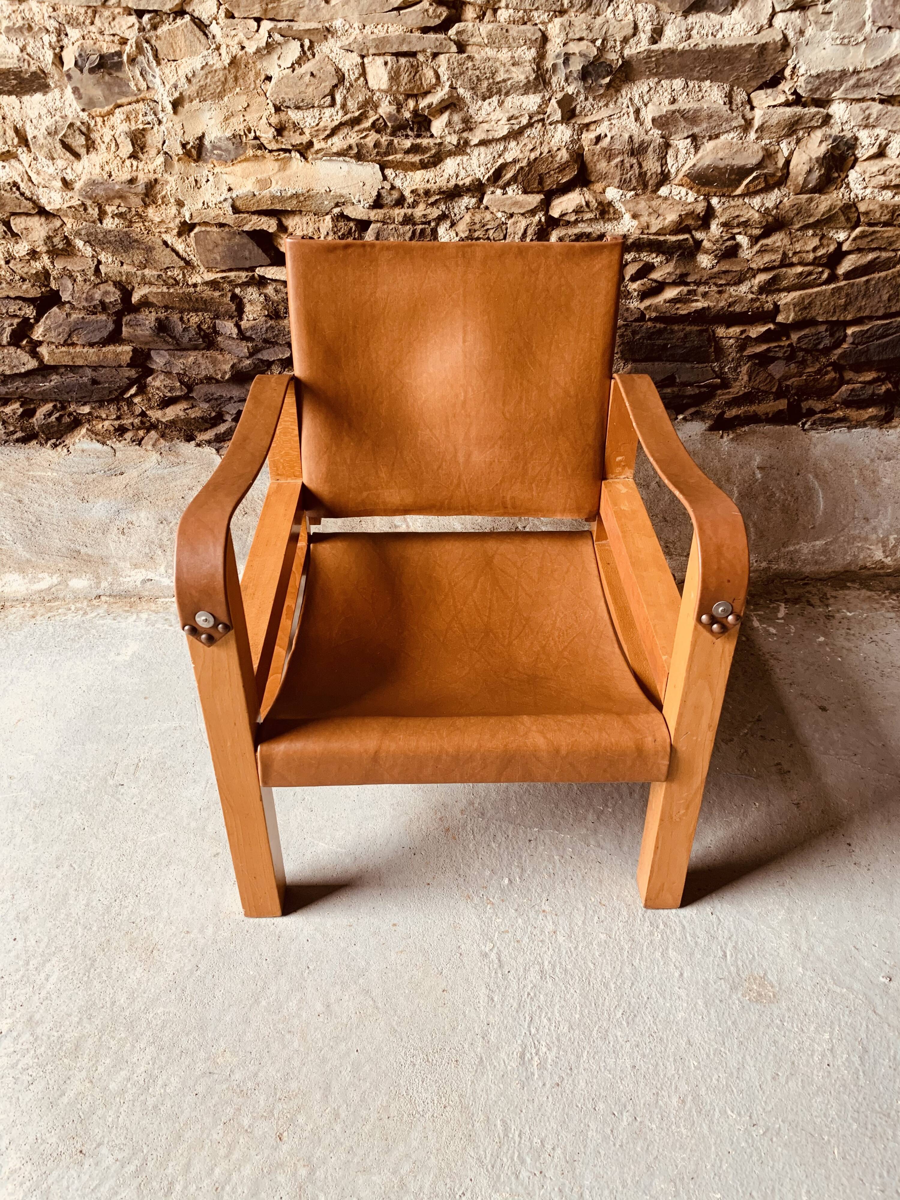 Safari armchair in wood and leather -1950's