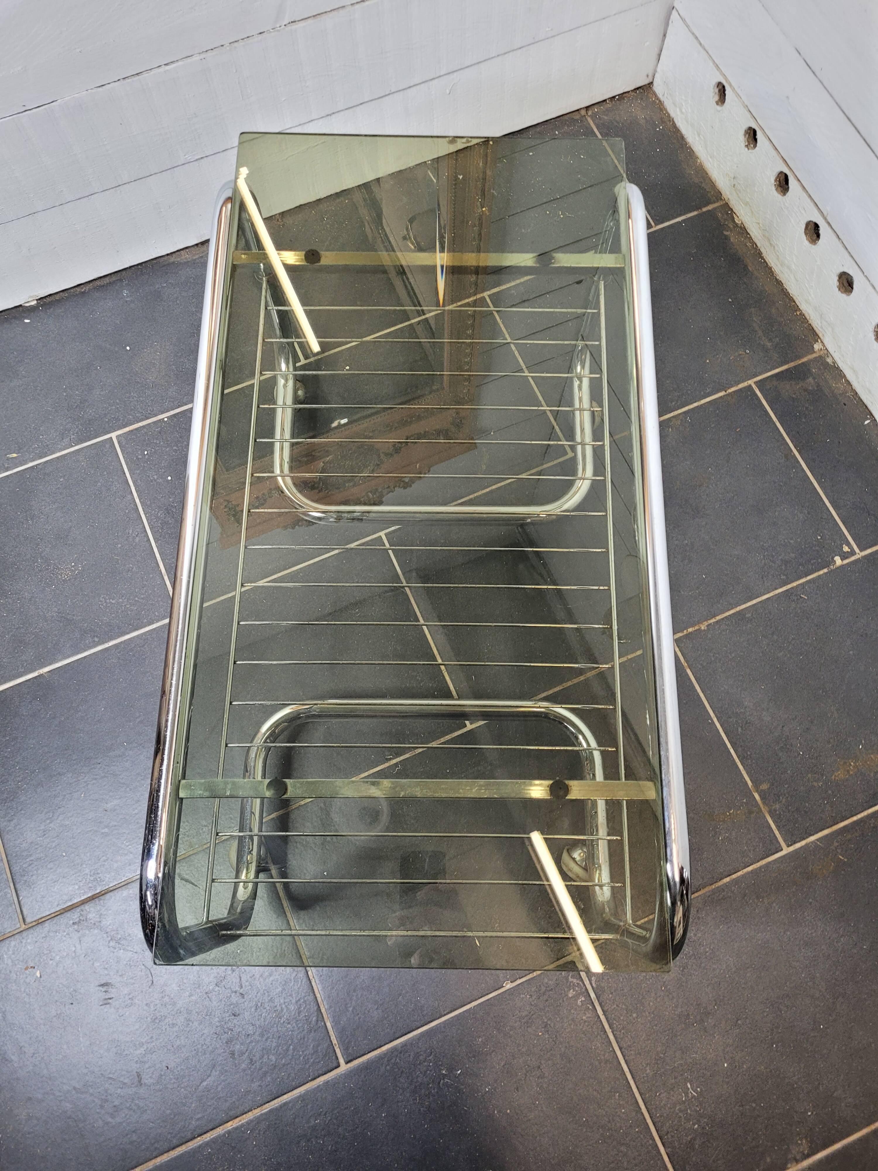 Coffee table with chrome base and smoked glass from the 70s