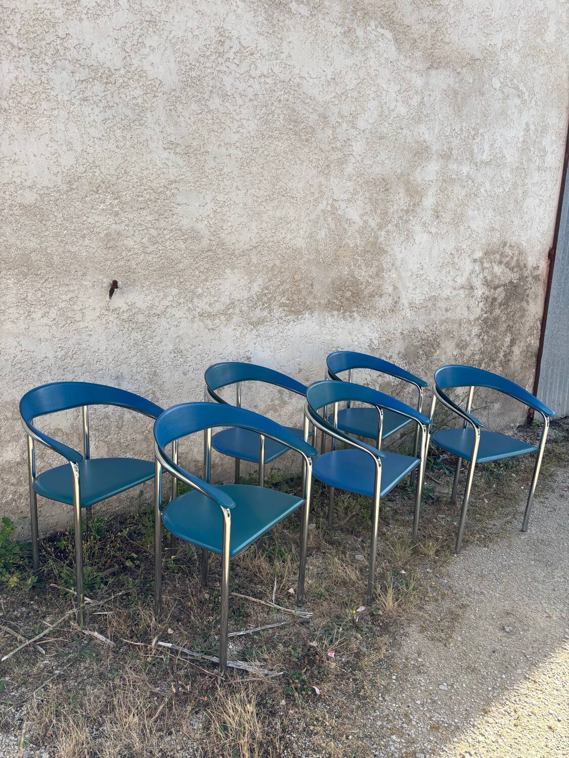Set of 6 vintage Italian design chairs in leather and chrome metal.
