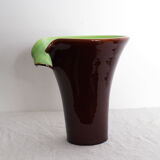 Brown and green vase with open edge rolled up