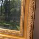 Antique mirror in rectangular beveled gilded wood in Louis XVI style