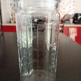 Glass measuring jar with cap
