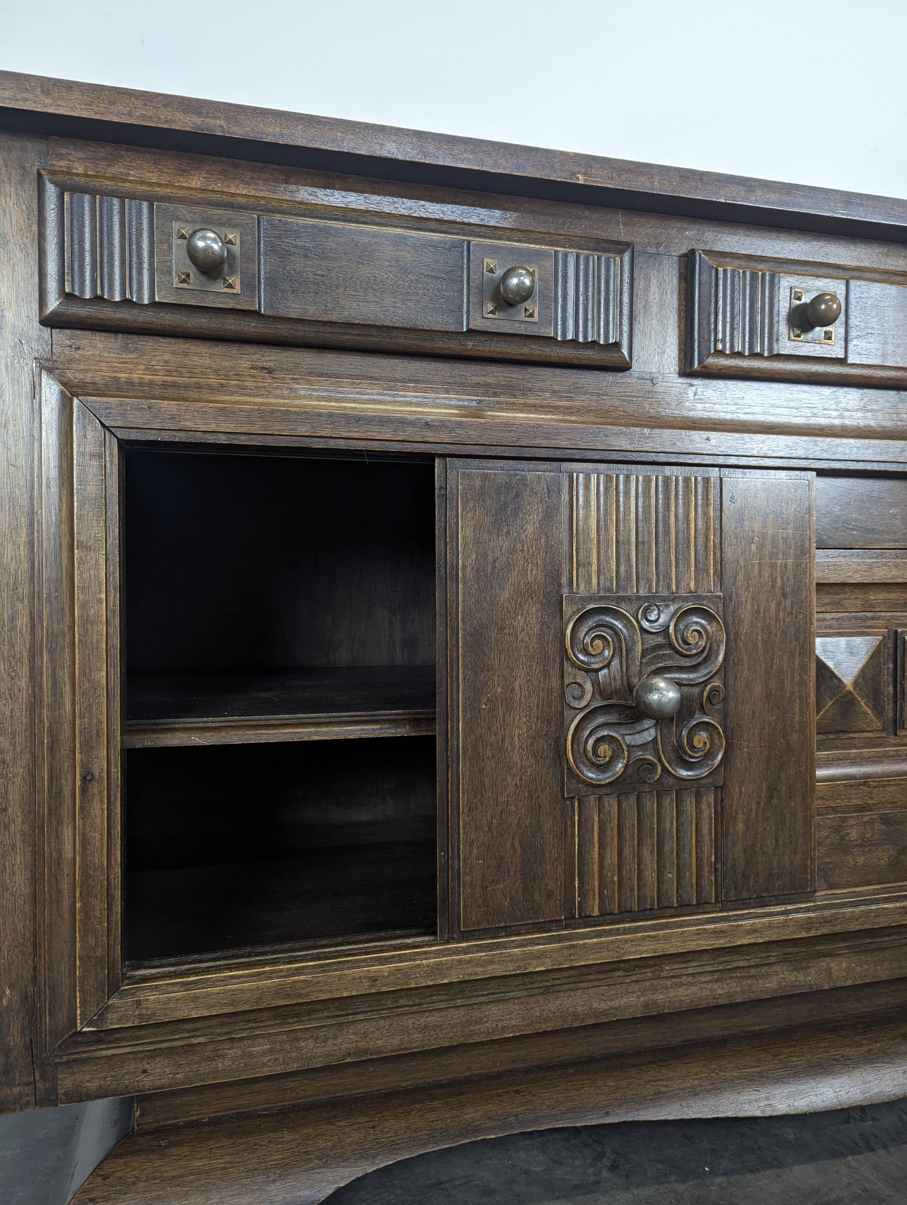 Art Deco oak enfilade with a diamond point decoration.
