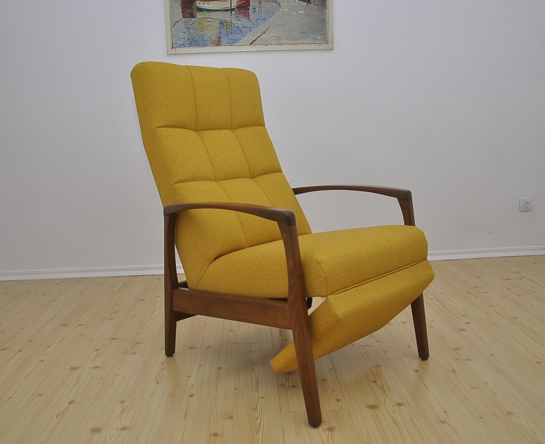 Mid-century armchair with folding footrest, 1960s