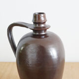 Old Norman bottle in brown ceramic