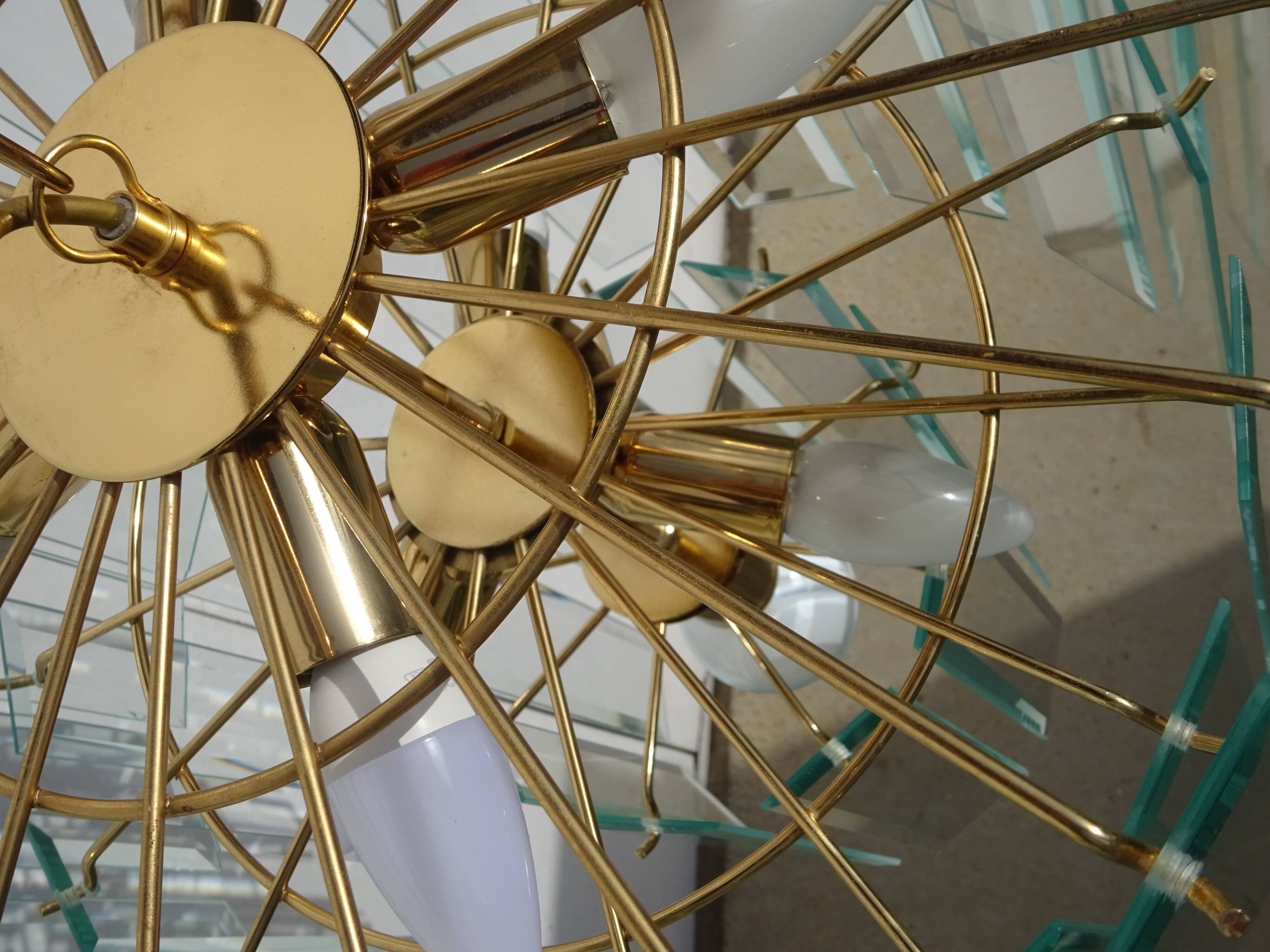 Brass chandelier and beveled glass, Italian manufacturing