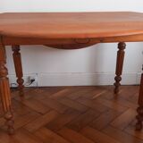 Round table with folding sides