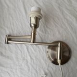 Wall lamp with articulated arm
