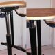 Industrial chair with height adjustment and foot rests
