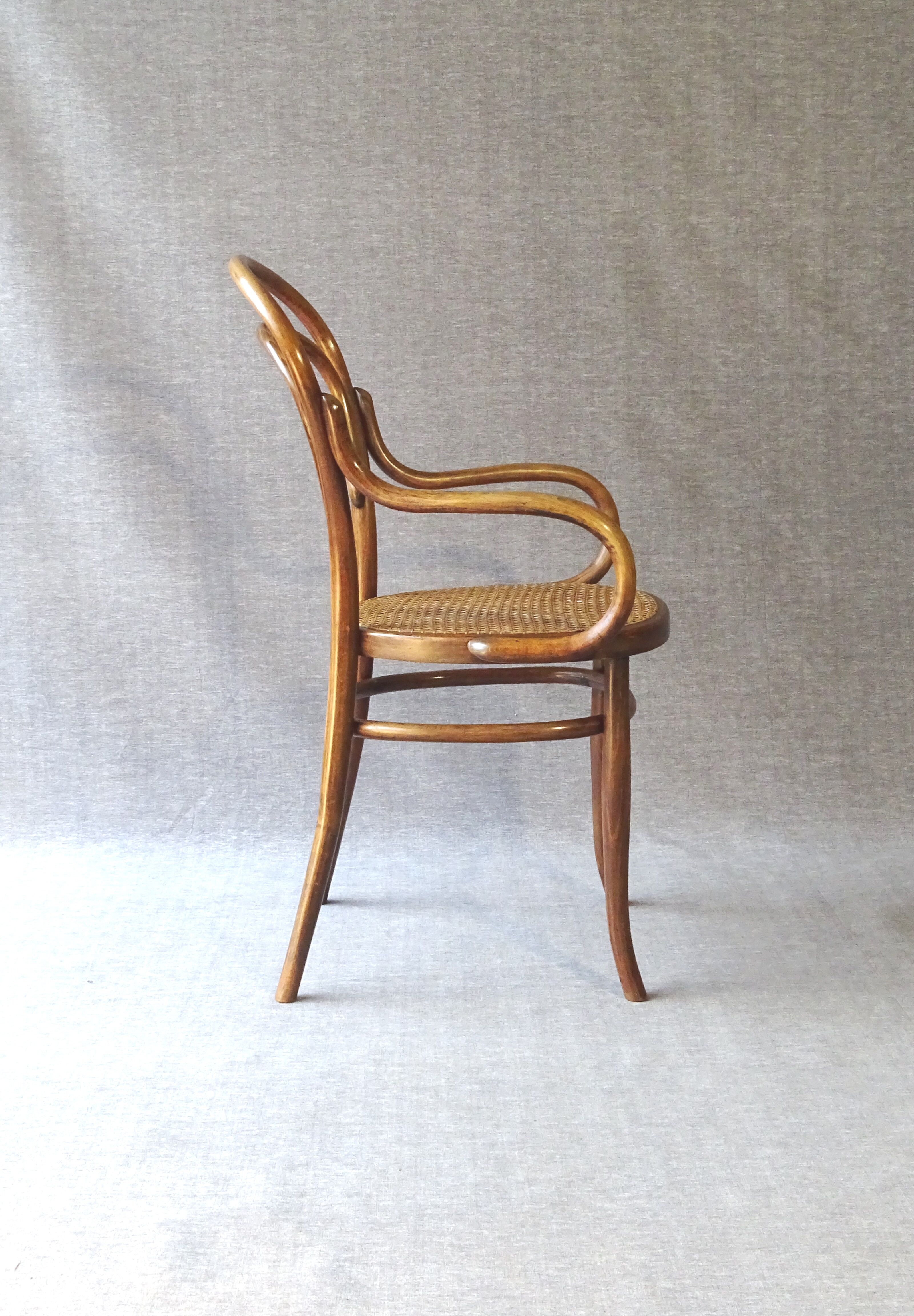 Viennese armchair in bentwood type canned bistro, circa 1900 UNGVAR