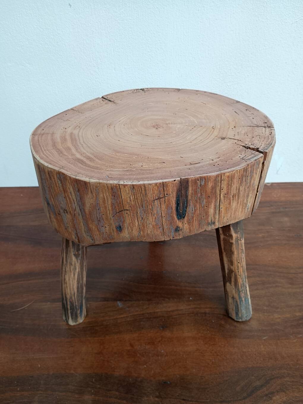 Brutalist tripod coffee table in solid wood.