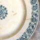 Plat rond Gien en terre de fer, service "Arabesques"
