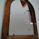 Old brass half moon mirror