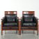Set of 2 black leather Art Deco design armchairs in good condition