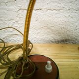 Small articulated desk lamp
