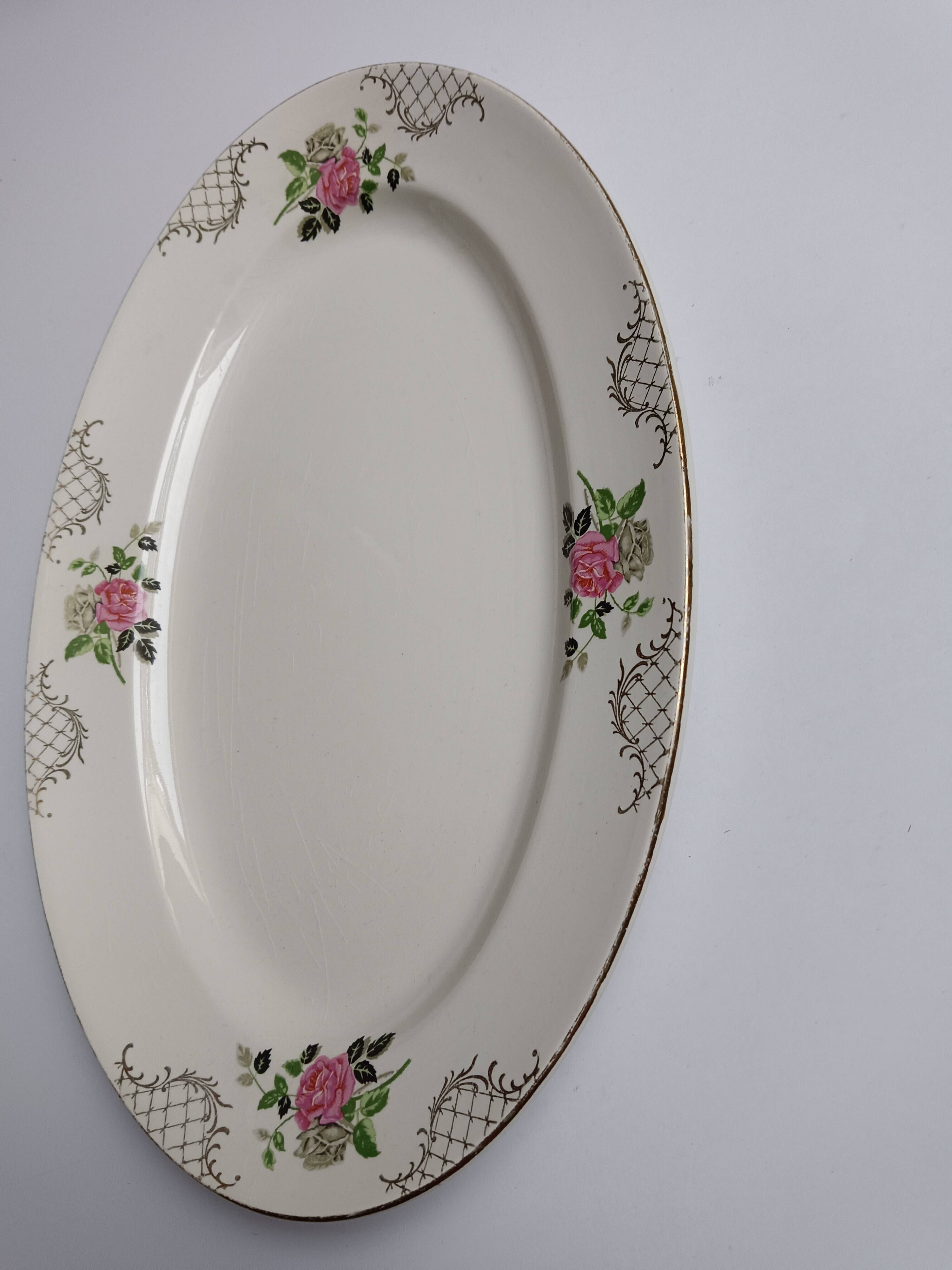 Oval plate Sarreguemines cream with pink gilding, antique.