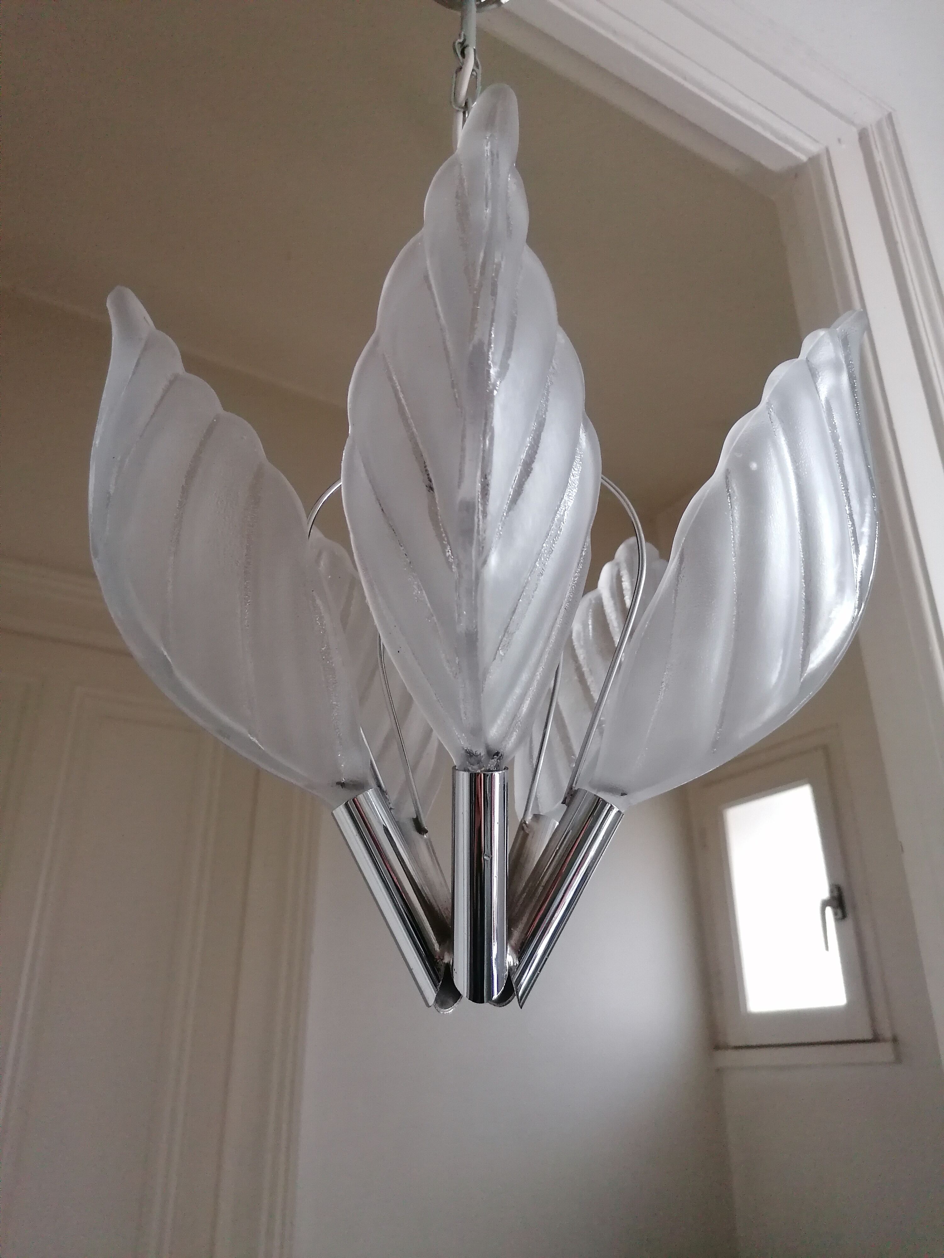 Chrome metal chandelier and glass plate