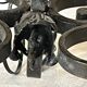Pair of 3-light wrought iron candlesticks on vintage legs
