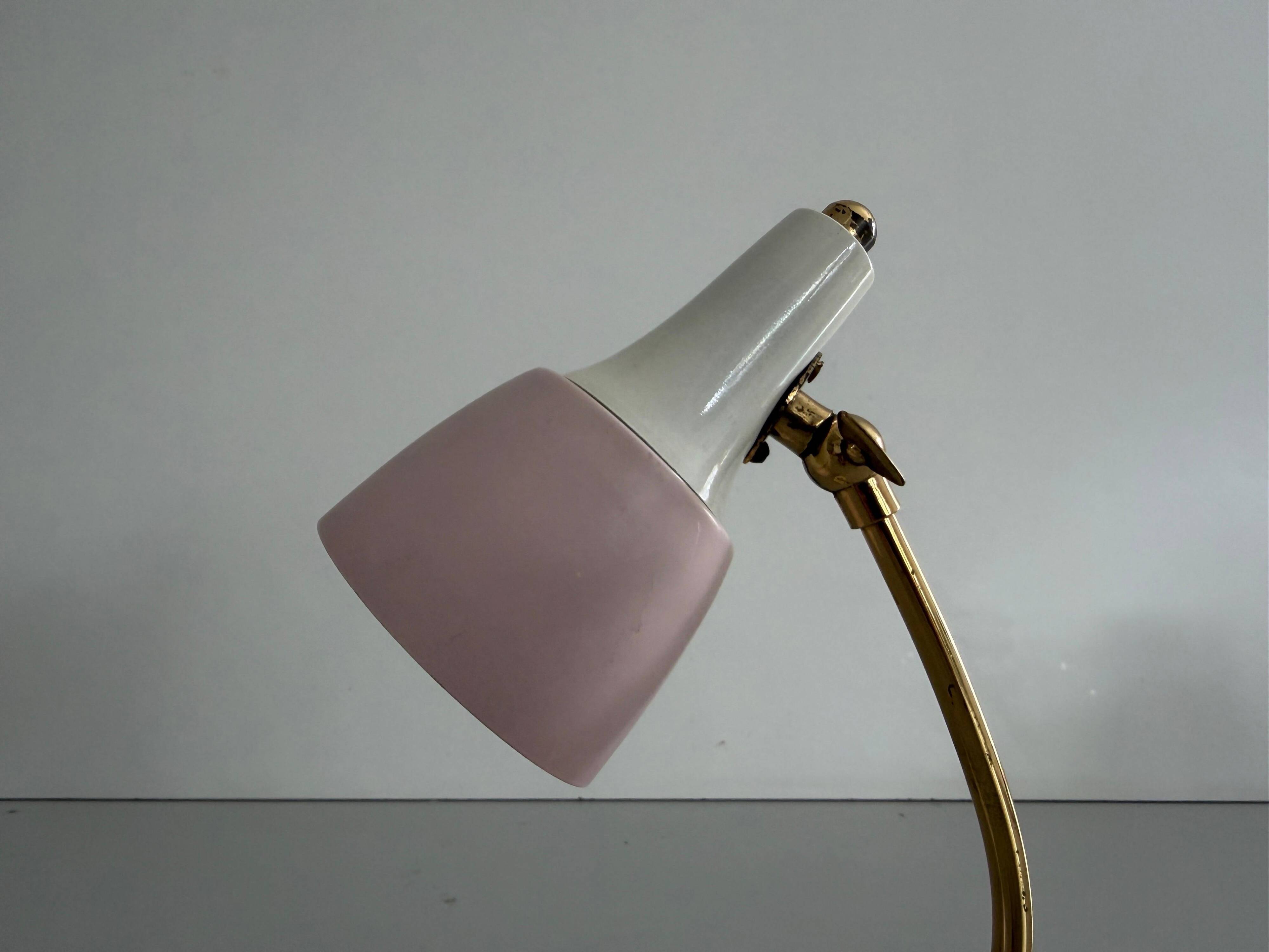 Simple table lamp with a pink metal head and brass body, 1960s, Germany.