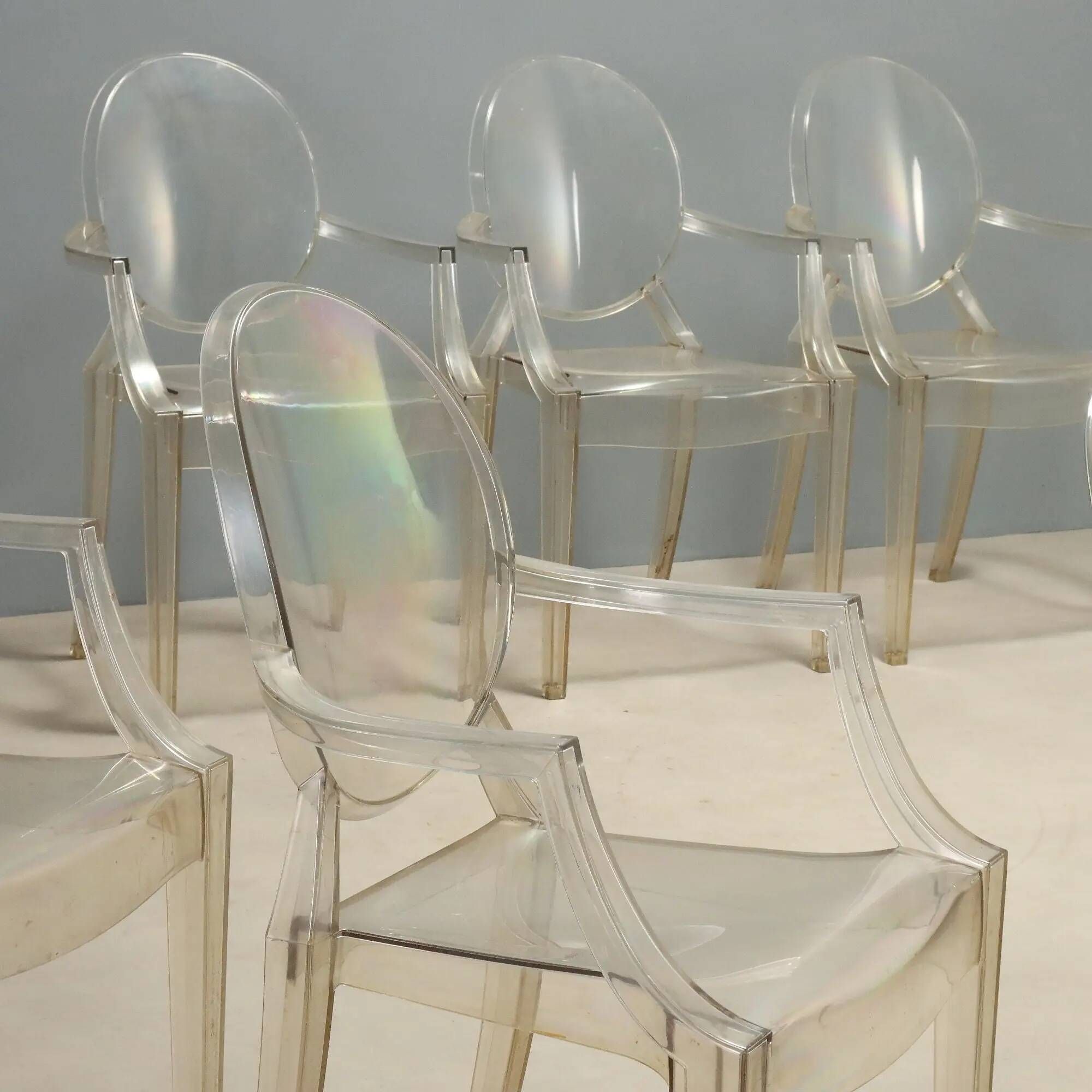 Louis Ghost chairs by Kartell designed by Philippe Starck from the 2000s.