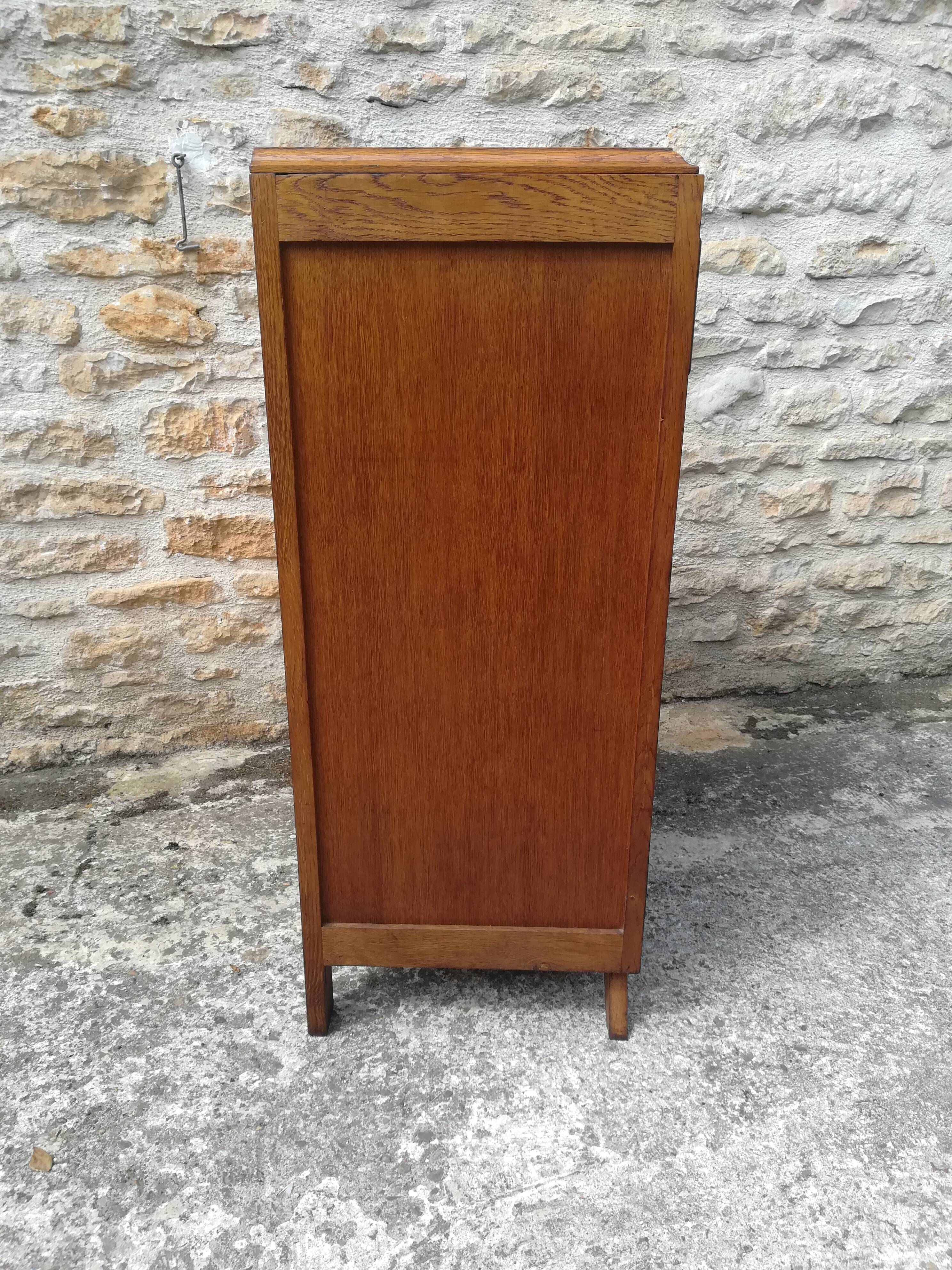 Commode en chêne a 5 tiroirs