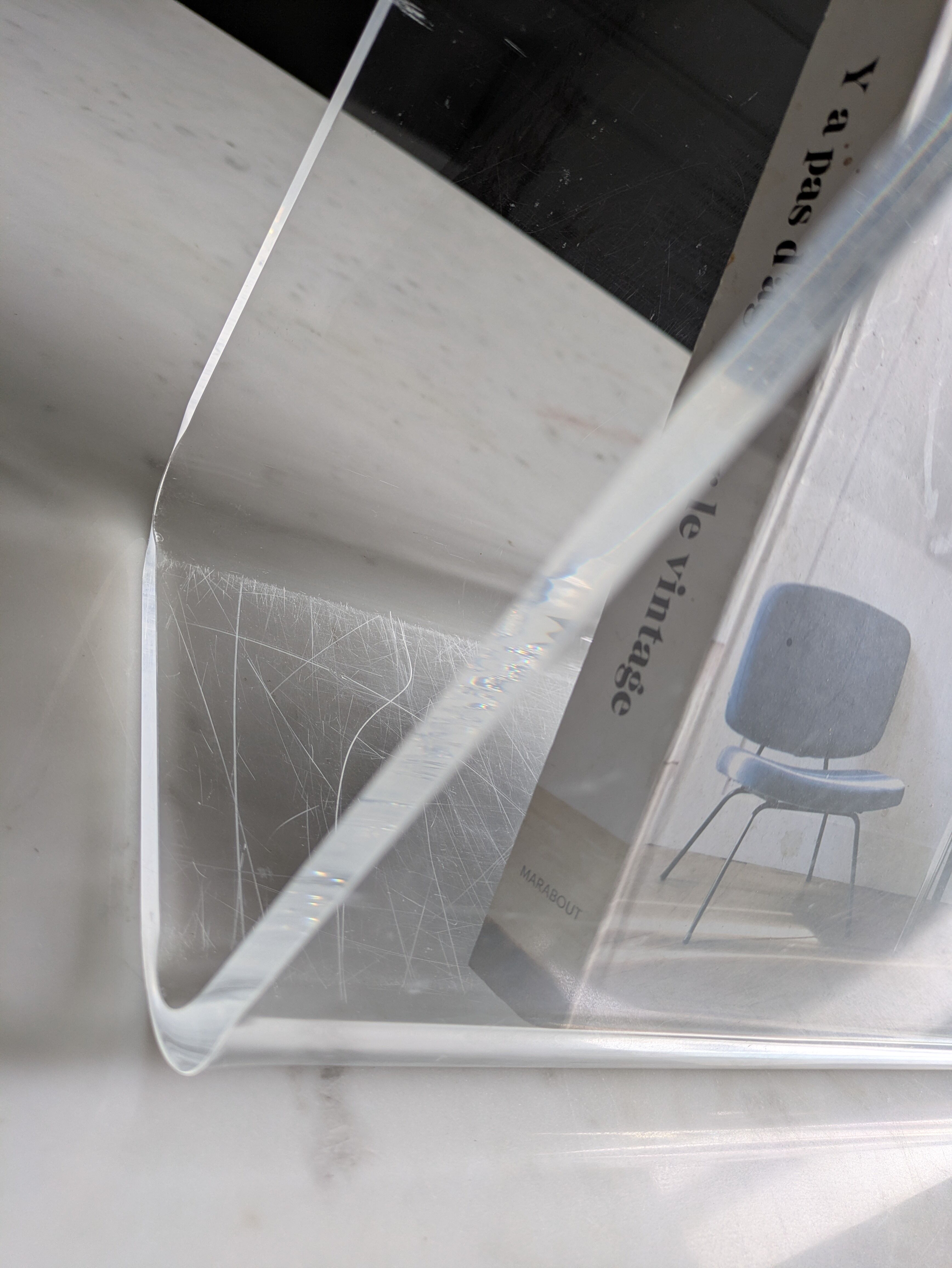 Plexiglass magazine rack by David Lange