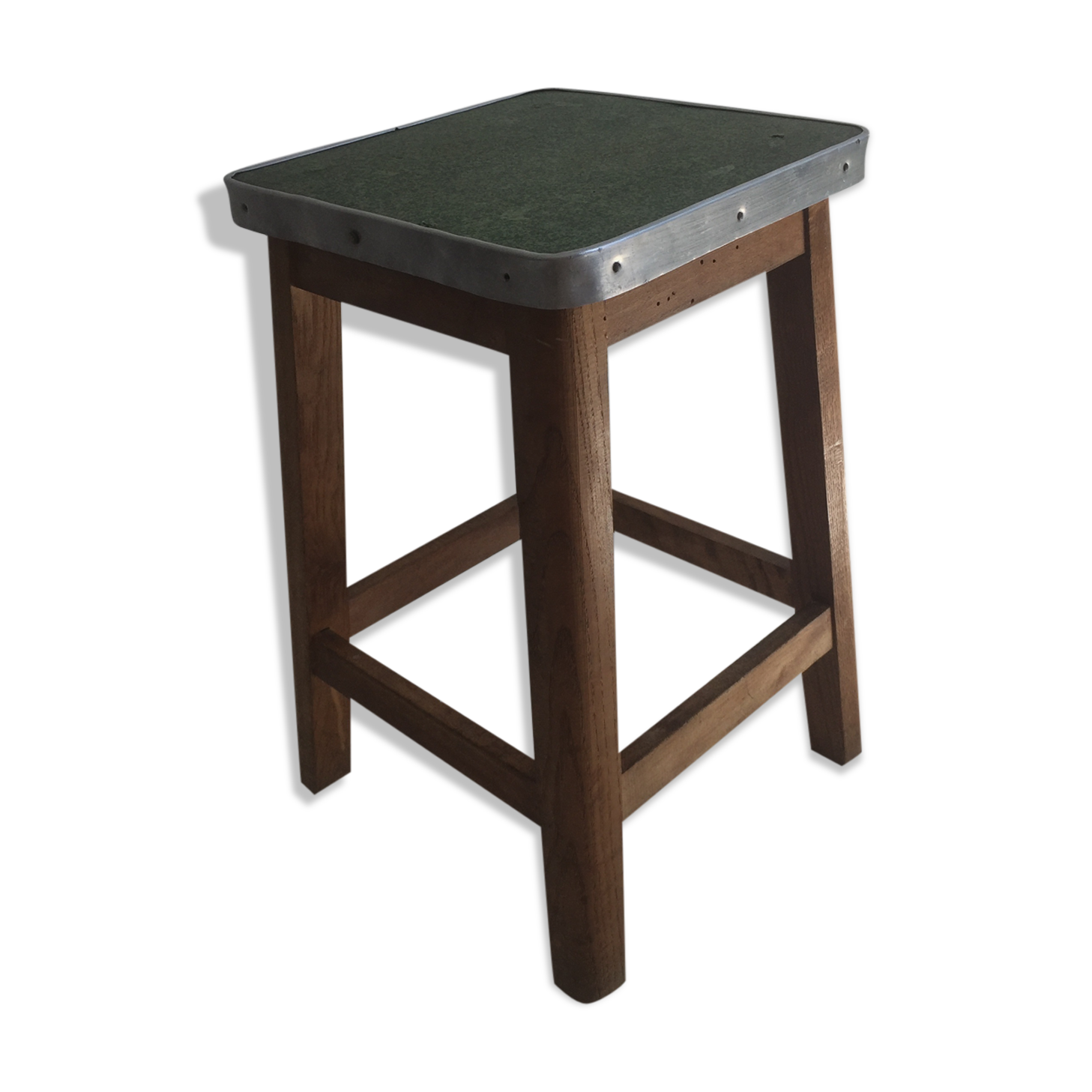 Wooden stool and green seat
