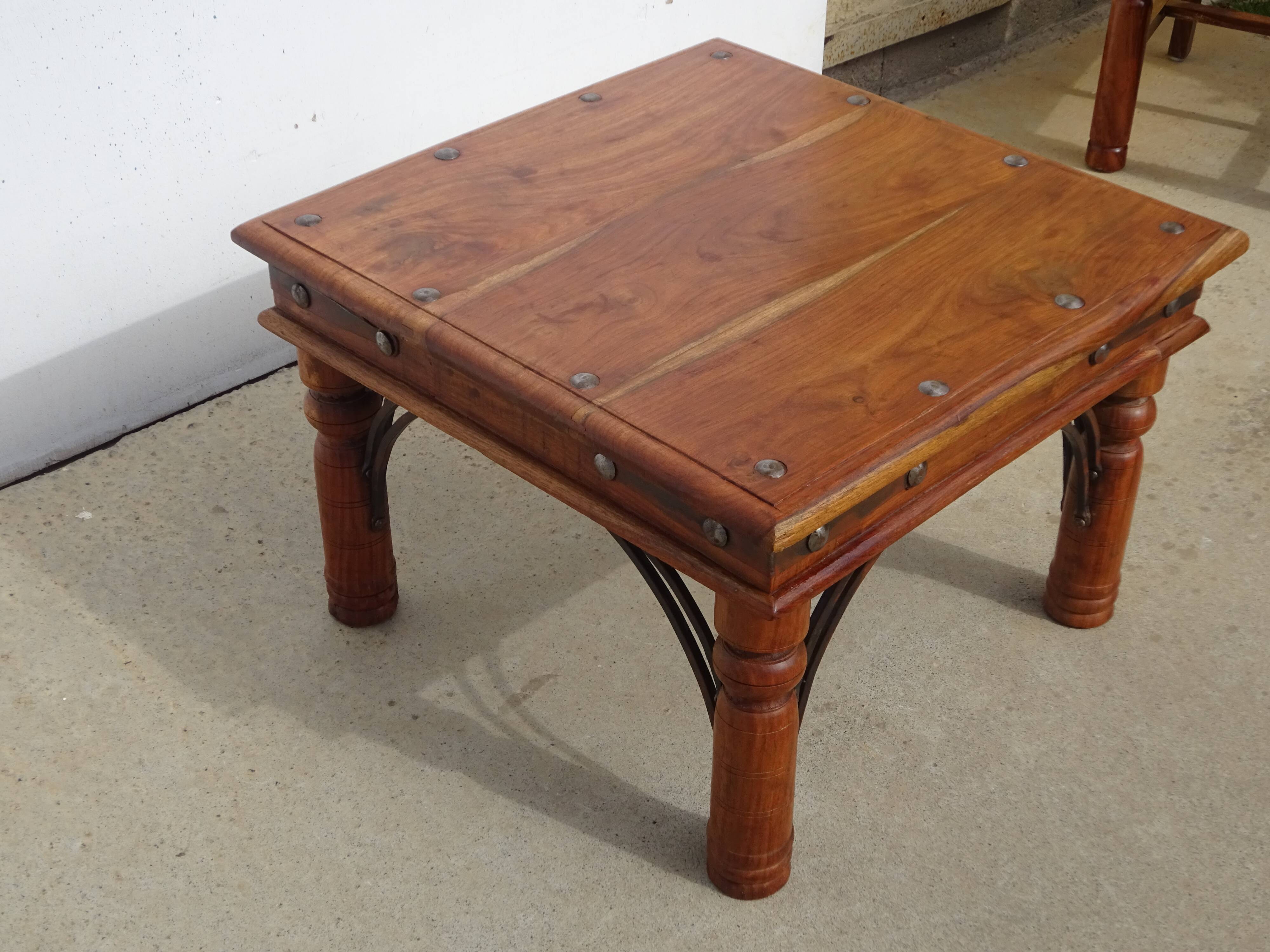Square coffee table in exotic wood and wrought iron.
