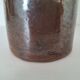 Bouteille en grès marron foncé vintage
