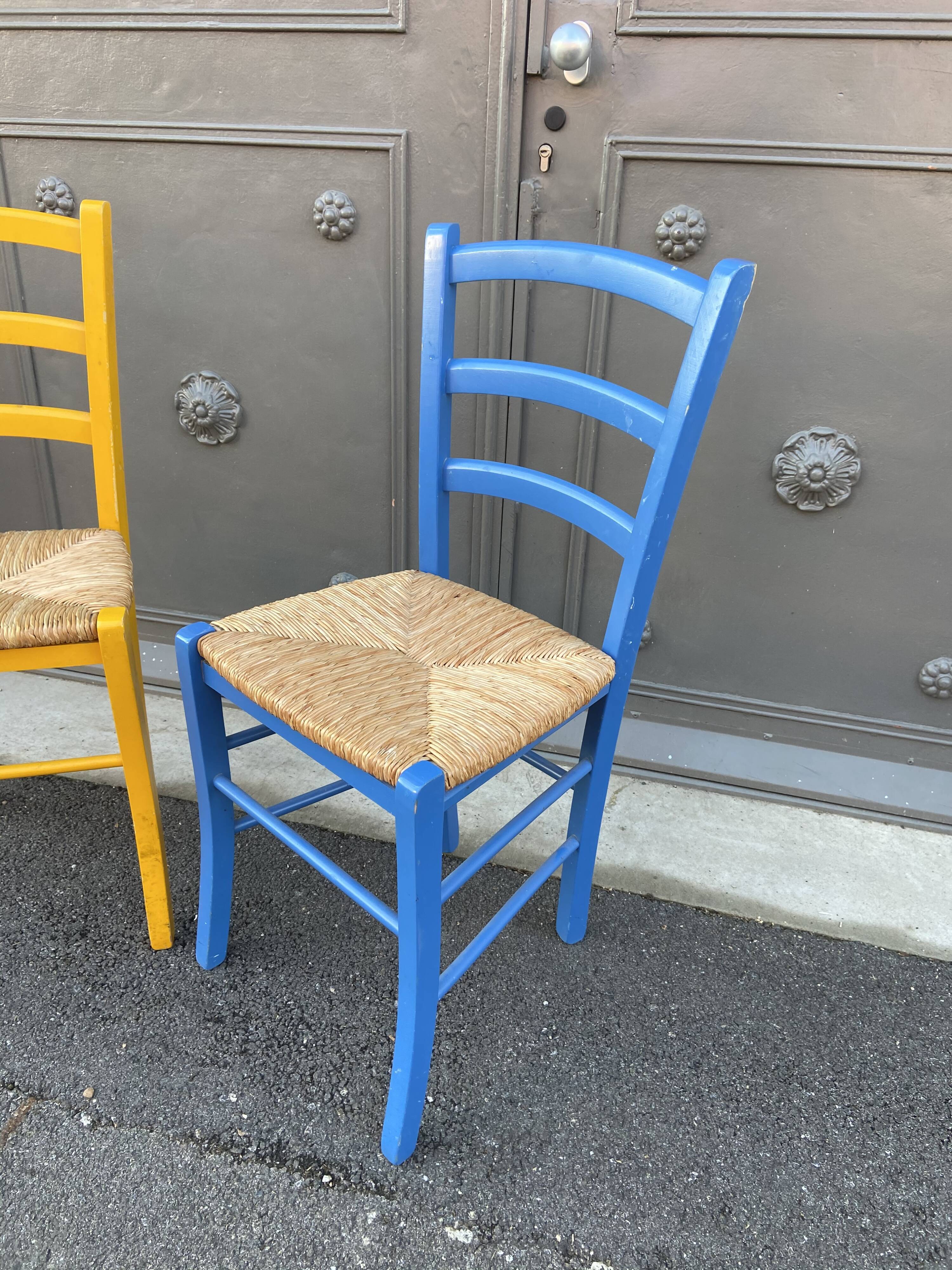 Fake pair of rustic vintage bistro chairs