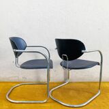 Pair of Effezeta chairs, tubular structure, chrome and black skai
