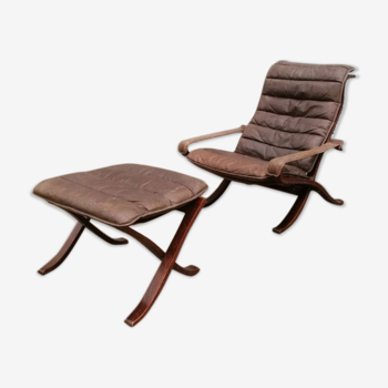 Leather siesta chair by Ingmar Relling and rests foot