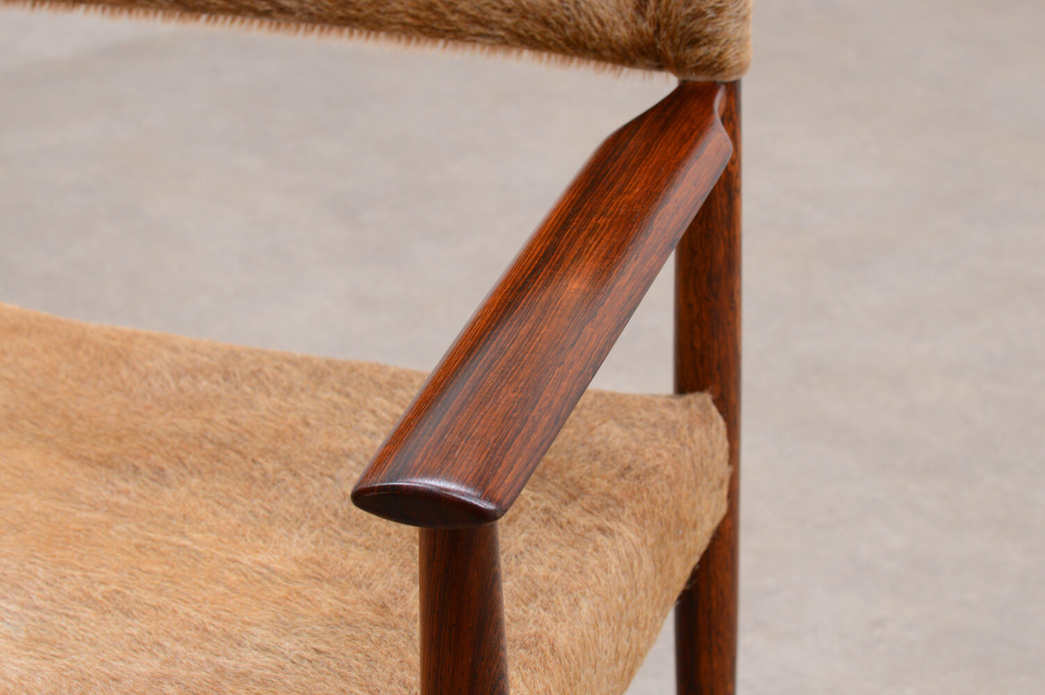 Rosewood and cow hide chair by Kurt Østervig for Sibast, 60s Denmark.