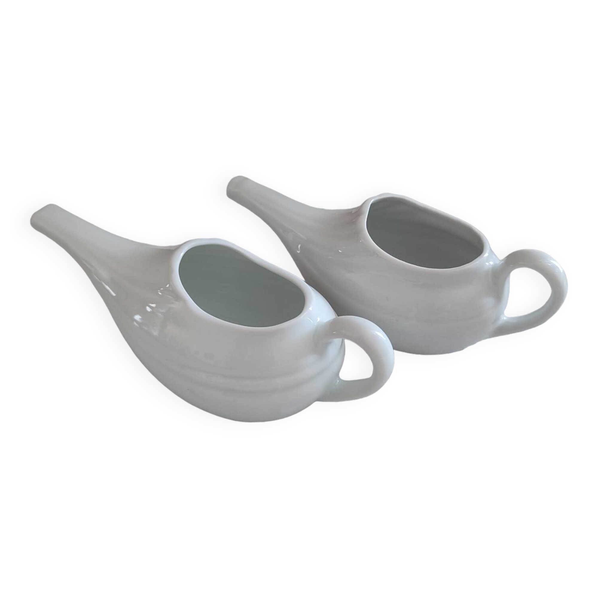 Duo of old white porcelain sauce boats for sick baby bottles