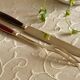 Service cutlery, brass and rosewood.
