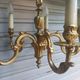 Antique gilded bronze chandelier in Louis XVI style, 5 lights, in working condition.