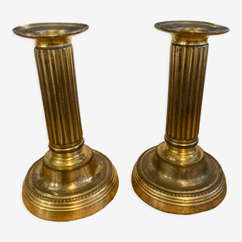 Pair of Louis XVI candlesticks in gilded bronze