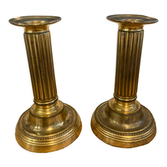 Pair of Louis XVI candlesticks in gilded bronze